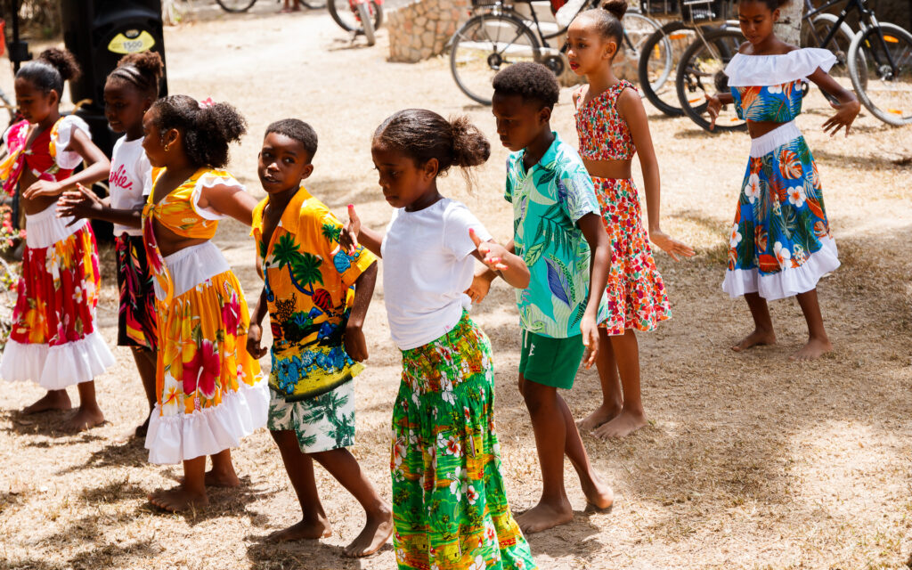 Local children are performing for Creole Festival on La Digue